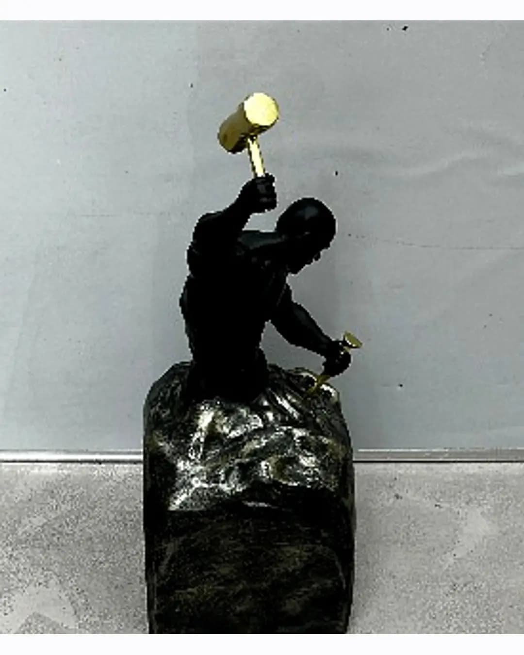 Hammer Man Sculpture